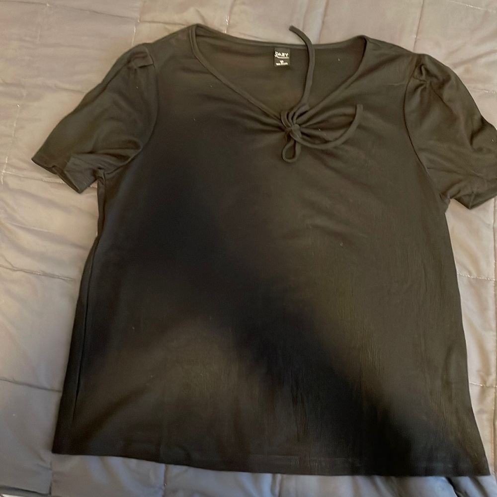 This is a Womens crop top. It’s a size XL but runs small, more like a medium.